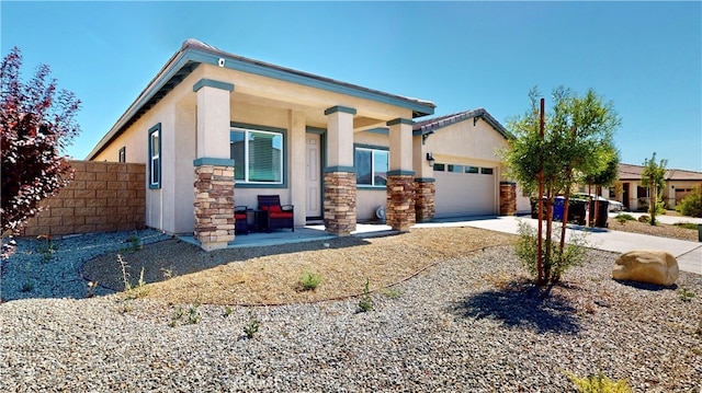 view of front of home with a garage