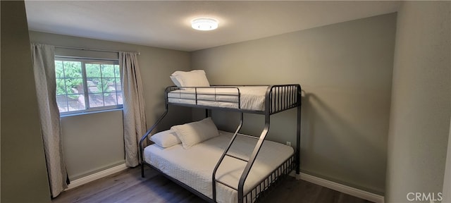 bedroom featuring dark hardwood / wood-style floors