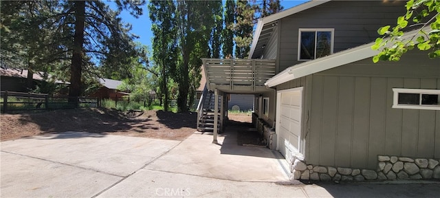 view of patio featuring a garage