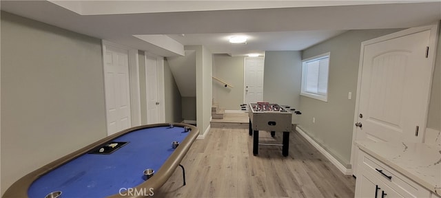 playroom with light hardwood / wood-style floors