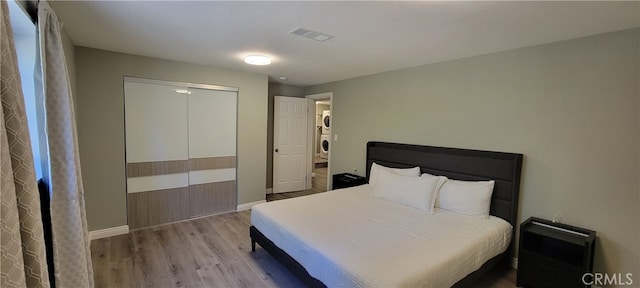 bedroom featuring light wood-type flooring