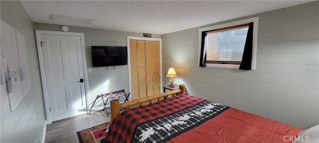 bedroom featuring dark hardwood / wood-style floors