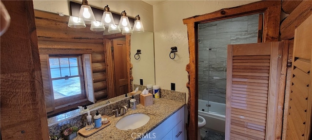 full bathroom featuring toilet, rustic walls, vanity, and shower / bath combination with glass door