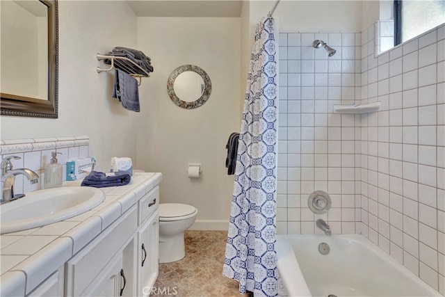 full bathroom featuring vanity, toilet, tile patterned floors, and shower / tub combo