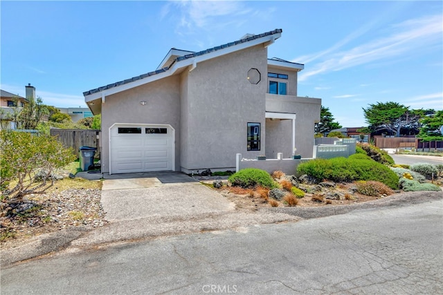 view of property exterior featuring a garage