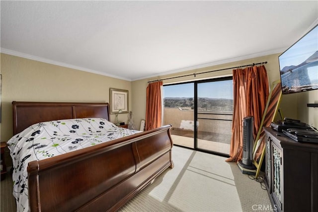 carpeted bedroom with crown molding and access to outside