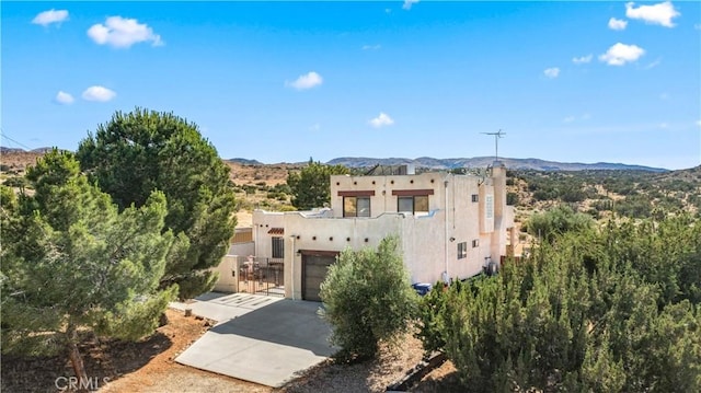 view of front of house with a mountain view