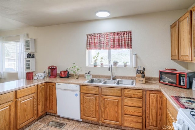 51 Apache Cir, Oroville, CA 95966 - kitchen featuring dishwasher, a sink, stove, and light countertops