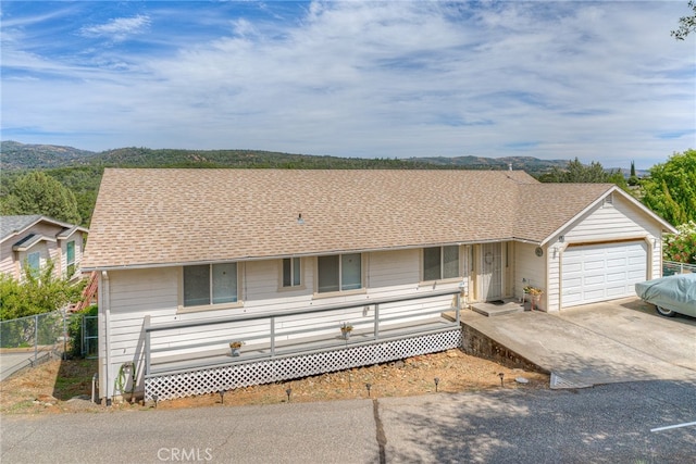 single story home featuring a garage