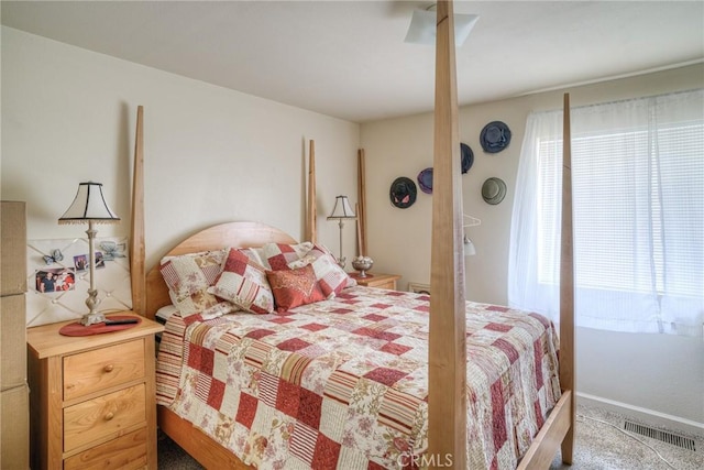 51 Apache Cir, Oroville, CA 95966 - bedroom with multiple windows and carpet flooring