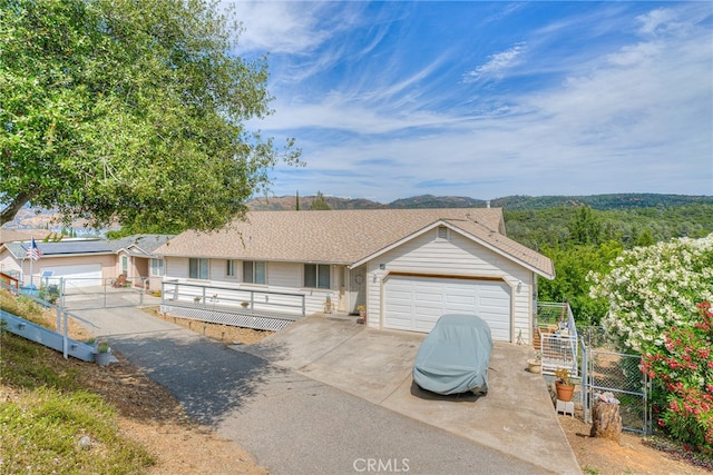 ranch-style home with a garage