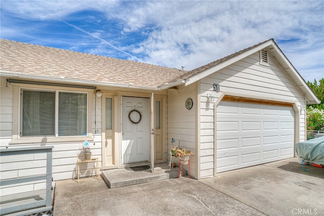 entrance to property with a garage