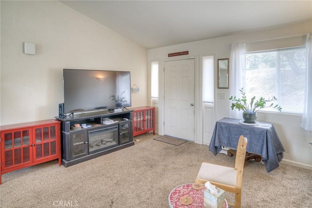 51 Apache Cir, Oroville, CA 95966 - carpeted living room with vaulted ceiling and baseboards
