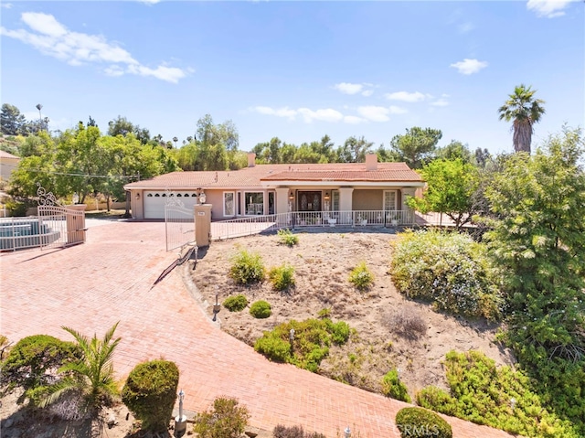 single story home with a garage