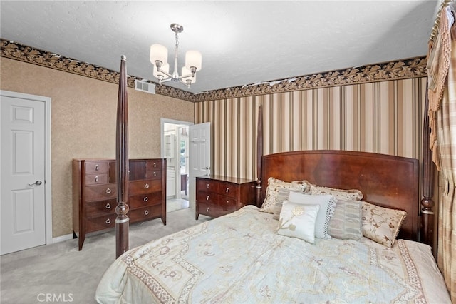 bedroom with light carpet, a chandelier, and a textured ceiling