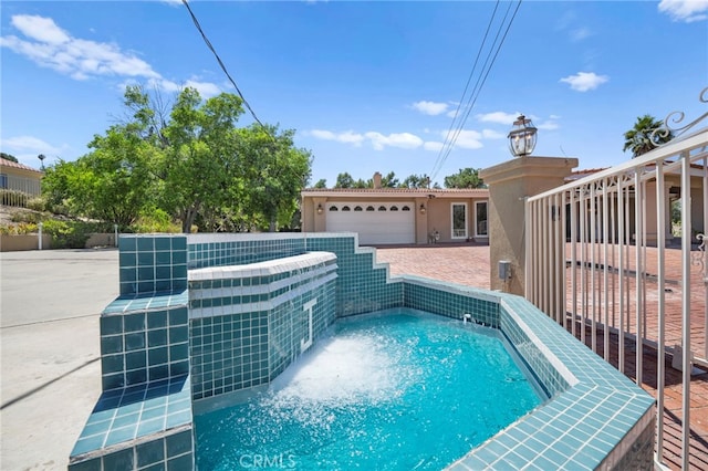 view of swimming pool featuring pool water feature