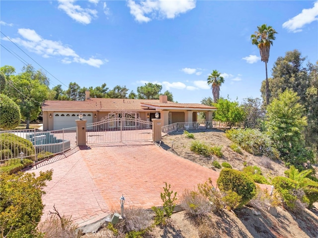 view of front of house with a garage