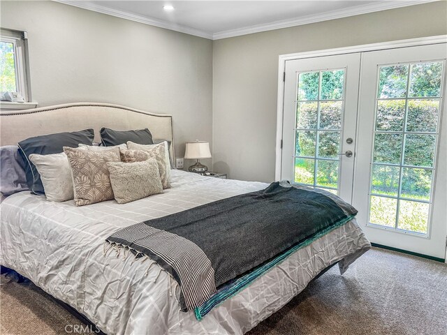 bedroom featuring ornamental molding, french doors, and carpet flooring