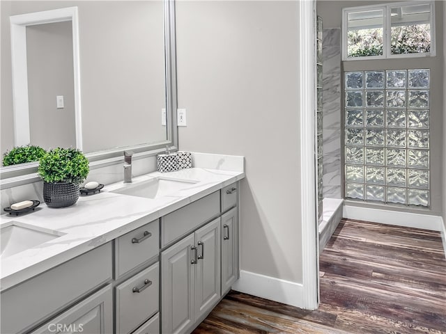 bathroom featuring vanity and hardwood / wood-style flooring