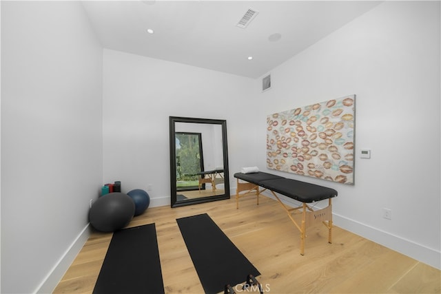 exercise area featuring light wood-type flooring