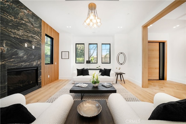 living room featuring a fireplace and hardwood / wood-style flooring