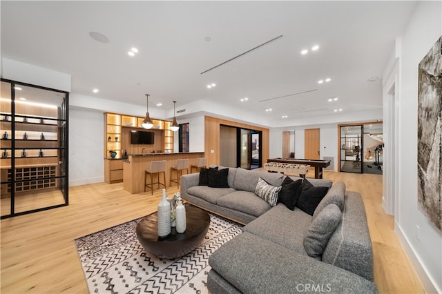 living room featuring light wood-type flooring