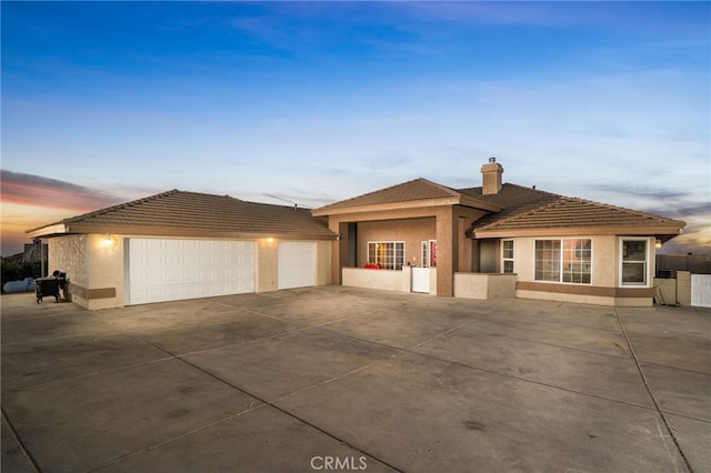 view of front of home with a garage