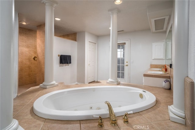 bathroom with vanity and separate shower and tub