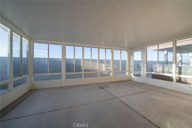 unfurnished sunroom with a healthy amount of sunlight