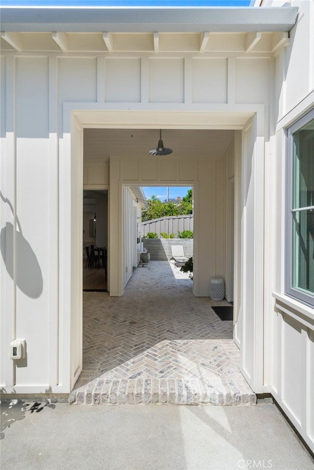 exterior space featuring ceiling fan