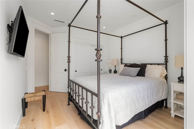 bedroom featuring hardwood / wood-style flooring