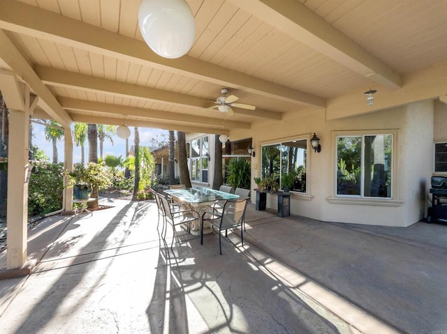 view of patio / terrace with ceiling fan and outdoor dining space