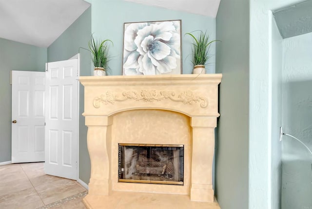 details with baseboards and a fireplace