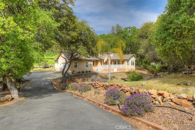 single story home featuring a garage