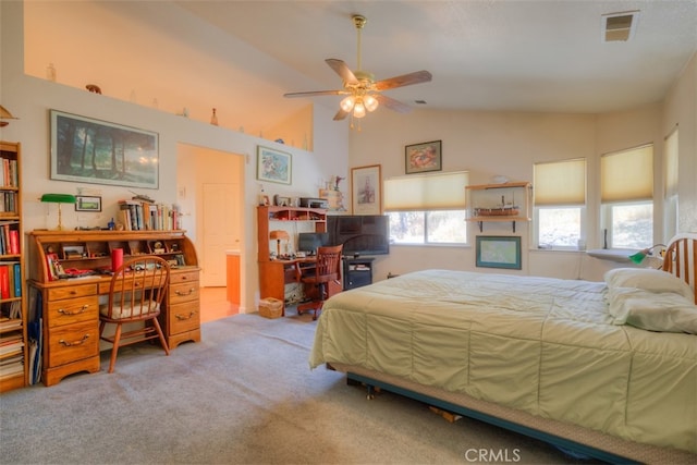 carpeted bedroom featuring lofted ceiling and ceiling fan