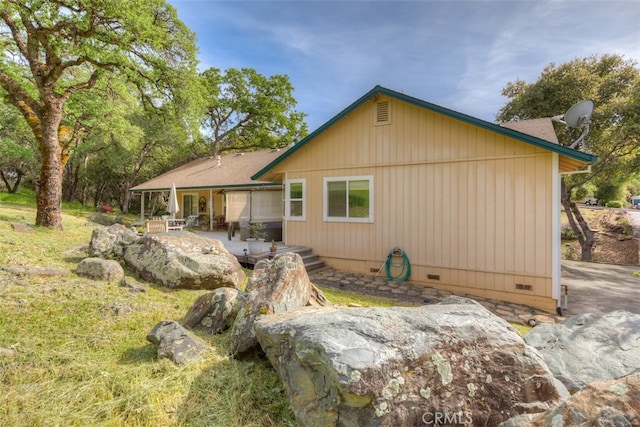 rear view of property with a patio area