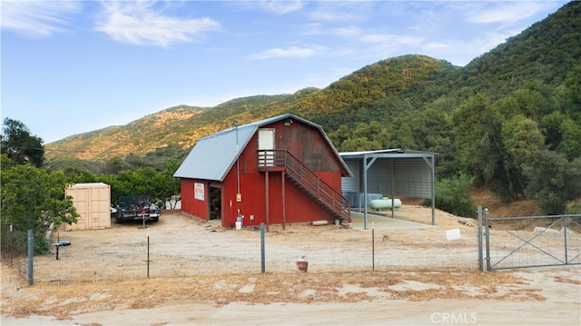 view of outdoor structure with a mountain view