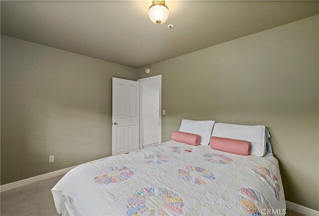 bedroom featuring carpet floors