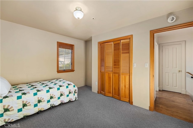 carpeted bedroom featuring a closet