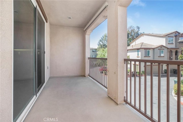 balcony featuring a residential view