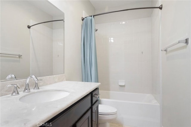 full bathroom featuring toilet, vanity, and shower / tub combo