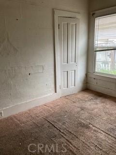 spare room featuring plenty of natural light