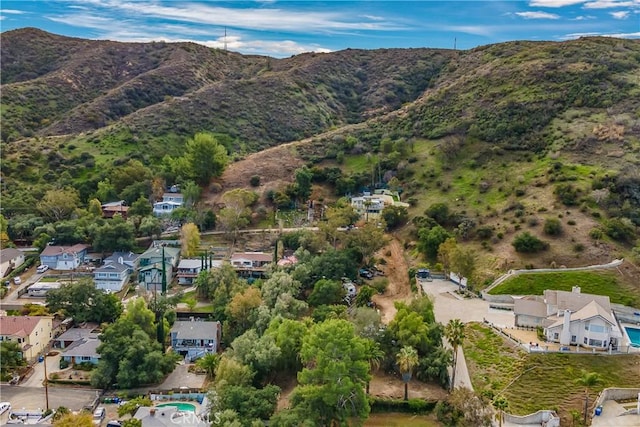 drone / aerial view with a mountain view and a residential view