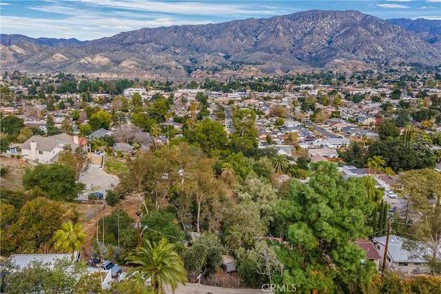 bird's eye view featuring a residential view and a mountain view