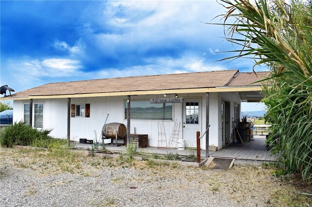 rear view of house with a deck