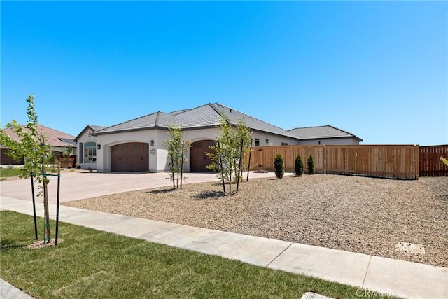 single story home with a garage