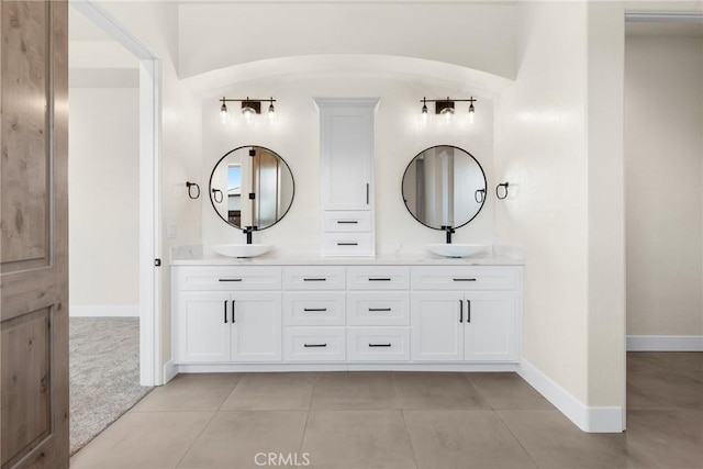 bathroom with vanity and tile patterned floors