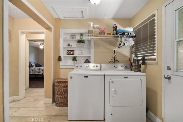 clothes washing area with ceiling fan, light tile patterned flooring, and separate washer and dryer