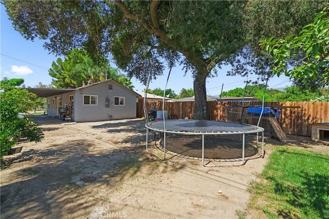 view of yard featuring a trampoline