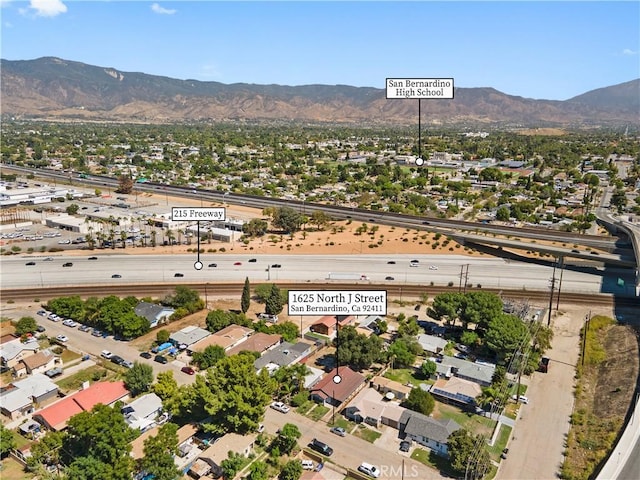 drone / aerial view featuring a mountain view